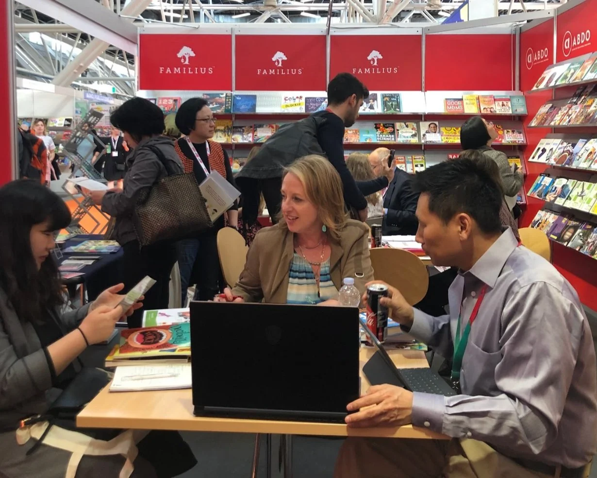 Publishing team evaluating book acquisition opportunities